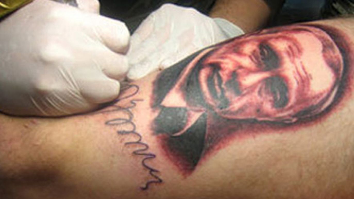 Татуировка Путин на плече