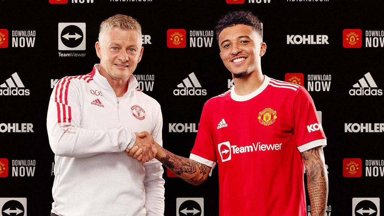 Jadon Sancho (z prawej) z trenerem Manchesteru United Ole Gunnarem Solskjaerem (fot. Ash Donelon/Manchester United via Getty Images) Jadon Sancho (z prawej) z trenerem Manchesteru United Ole Gunnarem Solskjaerem (fot. Ash Donelon/Manchester United via Getty Images)